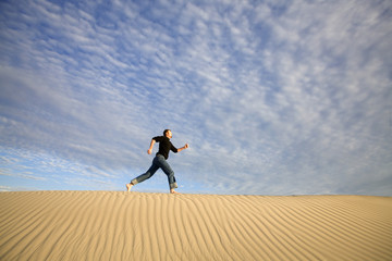 A man running in the desert