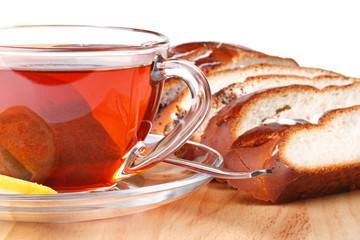 Fresh bun and cup of tea