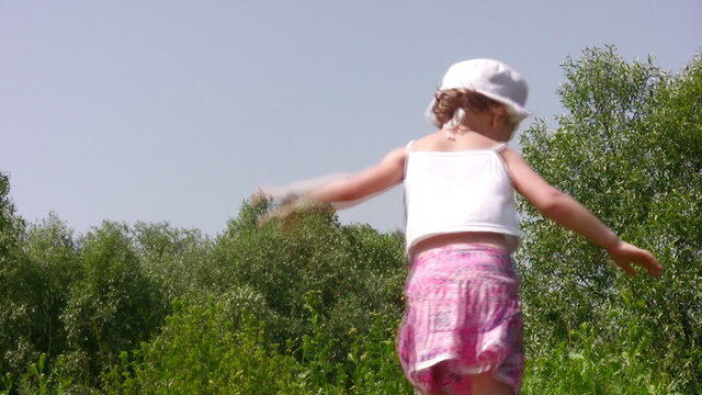 dancing little girl outdoor