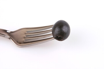 black olive and fork