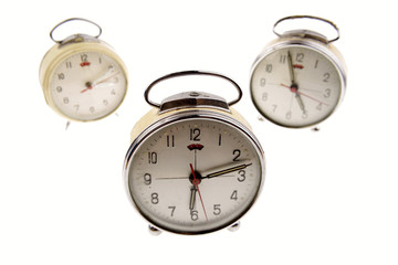 Alarm clocks on white background