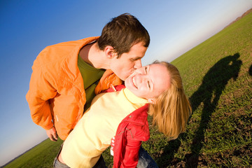Young love couple kissed