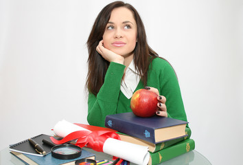 Female college students ,  red apple on a pile of books