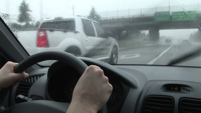 Driving in the Rain, Windshield Wipers Beating Back Downpour