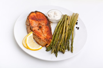 salmon with asparagus, lemon and sauce