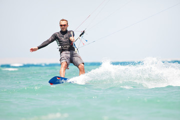 Kiteboarder surfing