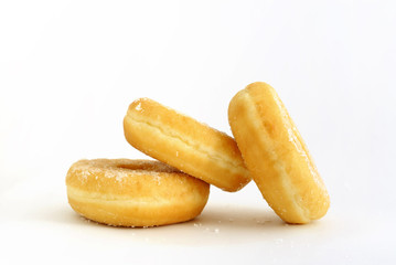 thre donuts on white background