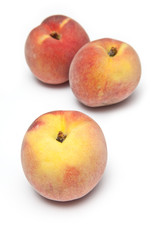 Fototapeta na wymiar Peaches isolated on a white studio background.