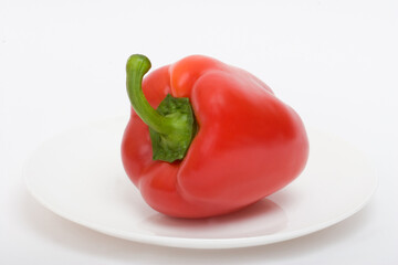 Red pepper and parsley on a white plate