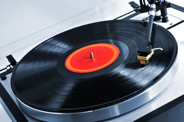 Record on turntable © Elenathewise