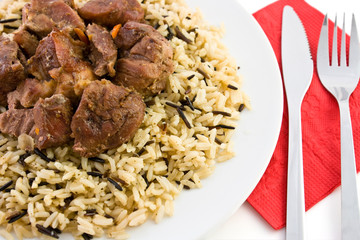 Fried beef with rice and red napkin