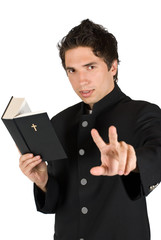 Listen me!Priest with holy bible speaking