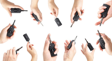 collection Keys from the car in a female hand. It is isolated
