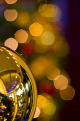 Gold Ornament and Christmas Lights