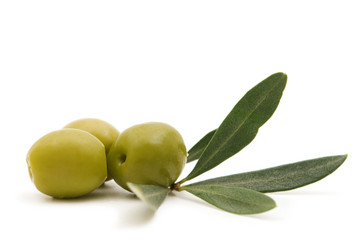 green olives on white background