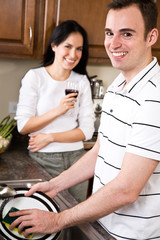 Young couple in the kitchen