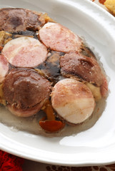 Medaglioni di lingua salmistrata e prosciutto cotto Lombardia