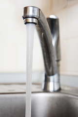 Water running down from faucet