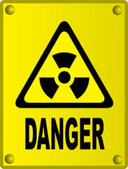 Obraz premium Radioactive sign on yellow metal board