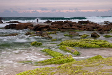 Sunset at rocky shore