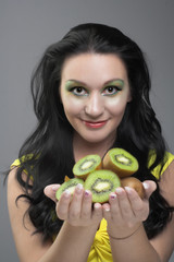 Portrait of young woman witn fresh fruit's