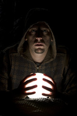 Wizard with glowing magical orb