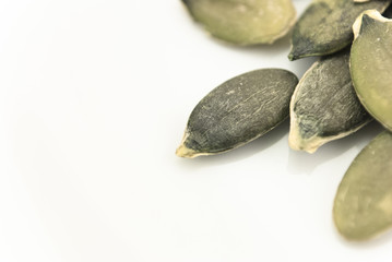 Pumpkin Seeds Closeup on White