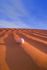 Golf Ball on Sand Dune Great Sand hills Sceptre Saskatchewan Canada