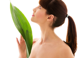 woman with green leaf