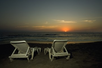 Lounge chairs on a beach