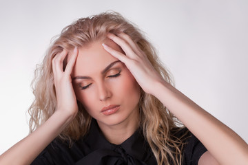 Fototapeta premium A shot of a girl with a headache