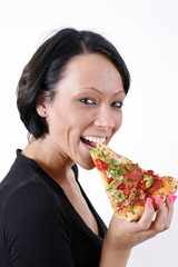 girl eating pizza slice