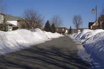 Snow piled on edge of street