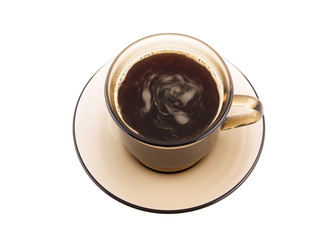 Coffee vortex in glass cup isolated on white