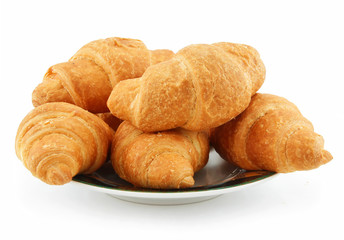 Group of Croissants on Saucer Isolated on White