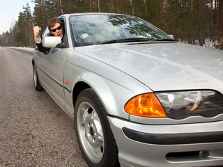 Aggressive driver in a left-hand driving car