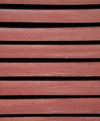 Red wall texture with shadows.