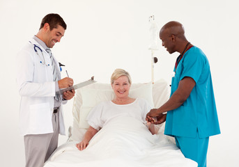 Doctors with a Patient