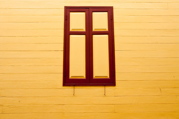 Monk's house windows with Thai style wood carving