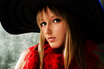 blond teen girl portrait with big hat