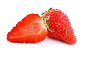 Ripe red strawberry. Whole and half