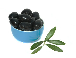 Blue cup full of black olives