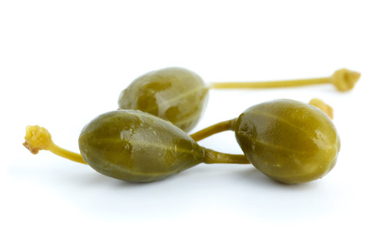 Macro shot of three capers fruits