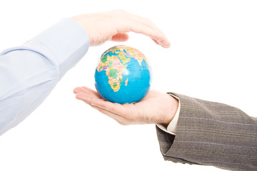 Hands holding and protecting earth, isolated on white