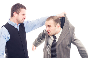 Angry business men fighting on a white background