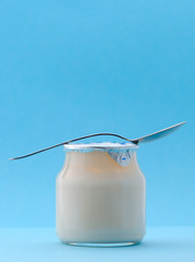 yogurt on blue background