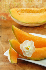 Whole Cantaloupe on a Wood Table