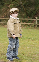 Toddler boy, styled to antic