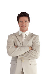 Businessman with folded arms isolated against white