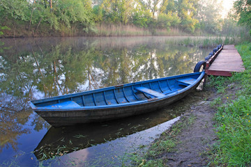 Blue boat on river